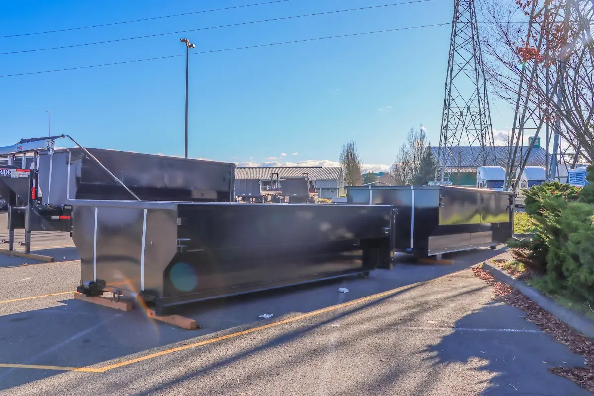 Roll-off dumpster ready for waste disposal at job site for Concrete Dumpster Rental in Dundee